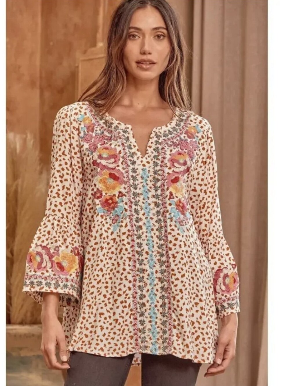 Savanna Jane boho tunic top features a striking combination of a black-and-tan M